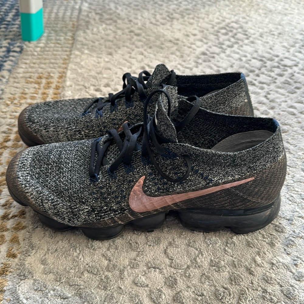 Nike Men's Black/Grey Flyknit Sneakers with Pink Swoosh